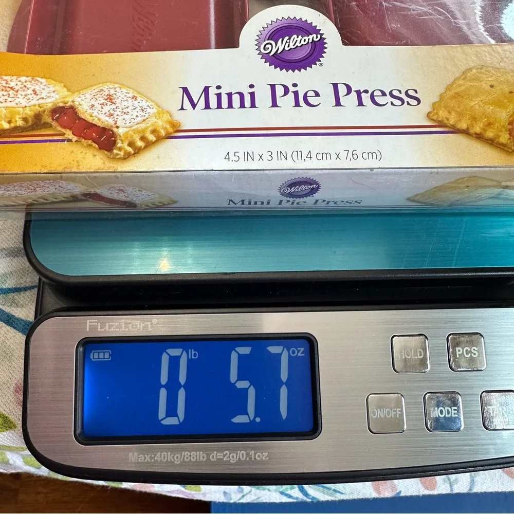 Set of‎ 2 unopened Wilton red mini pie press